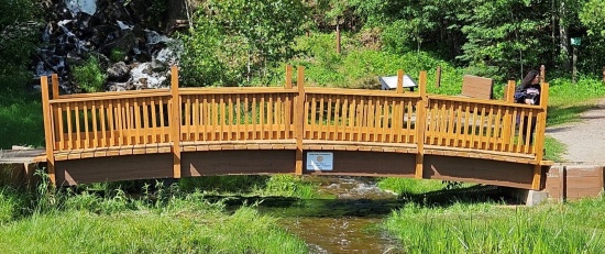 Fumee Creek Bridge before after railings and deck board